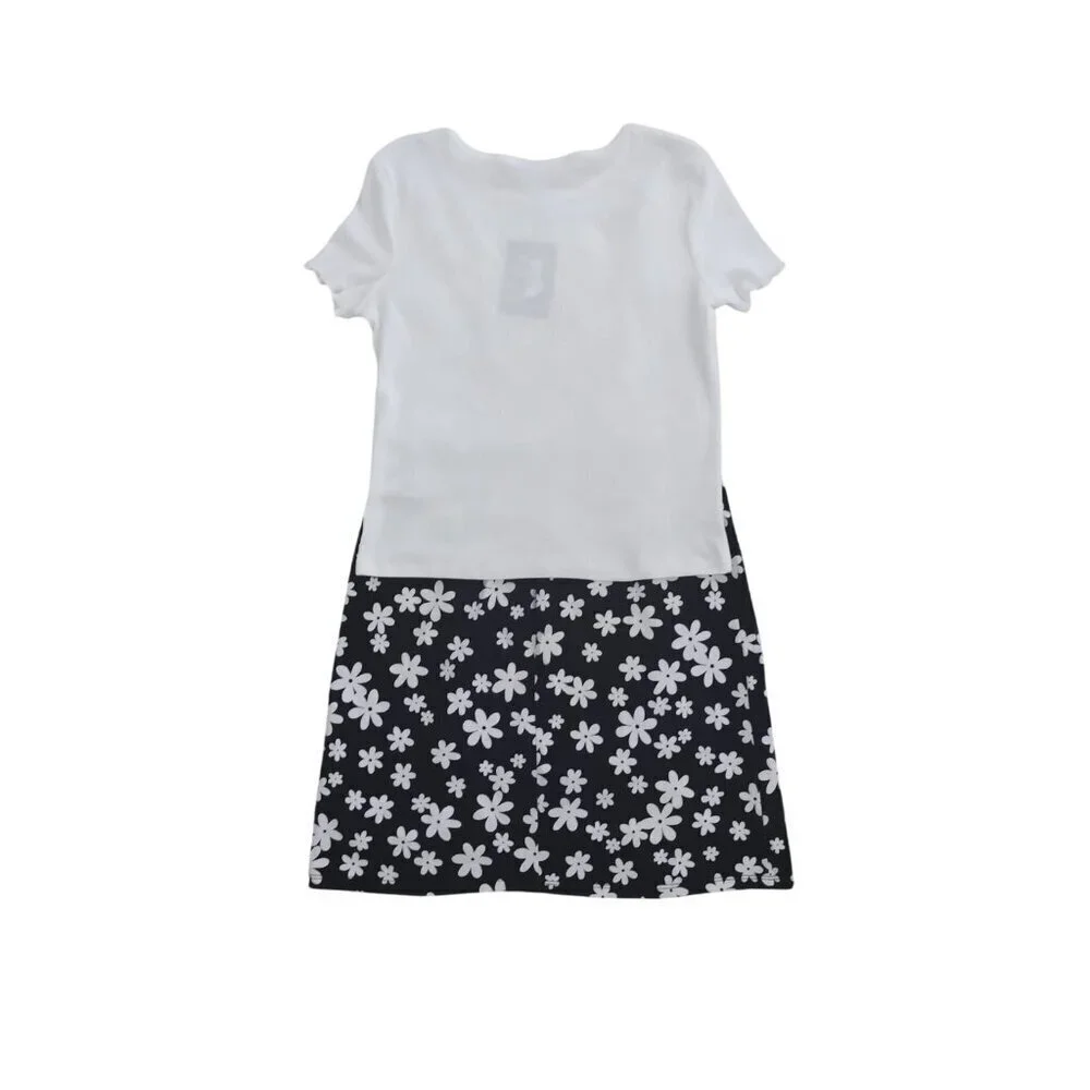 art class. Girls black and white floral print dress and white shirt sleeve. NWT